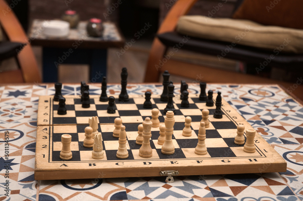 Chess game on the colorfull table. Chess game on the colorfull table.
