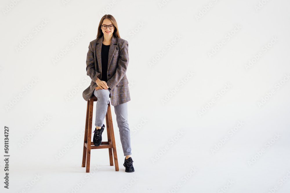Happy business woman in office chair on white background