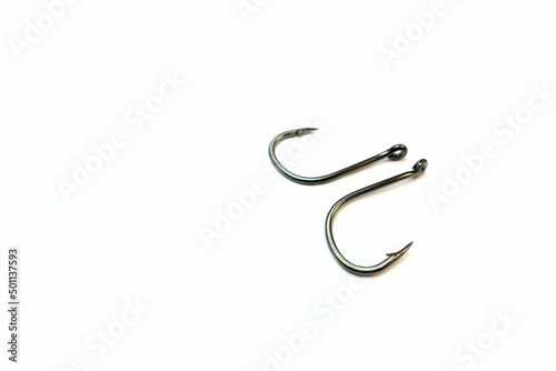 Fishing hooks on a white background. Isolated object. Fishing gear.