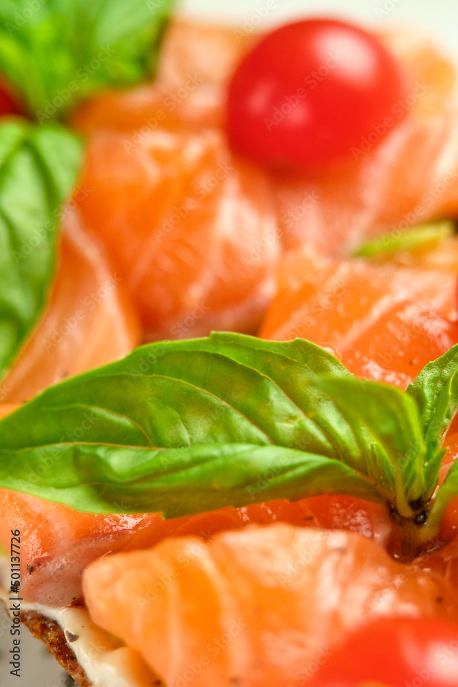 Bruschetta with pickled trout and salmon basil and tomatoes Bruschetta with pickled trout and salmon basil and tomatoes