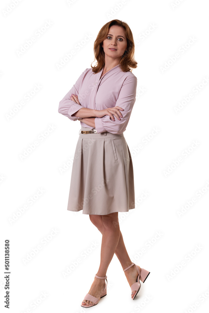 Full length young business woman standing with crossed arms isolated on white background Full length young business woman standing with crossed arms isolated on white background