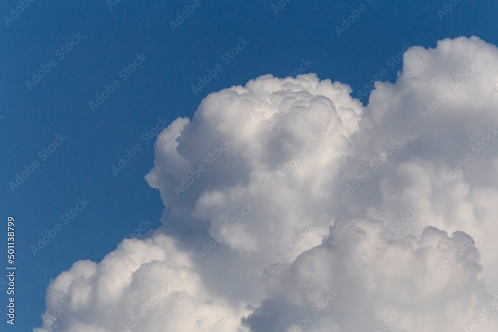 close up of rain cloud against blue sky close up of rain cloud against blue sky