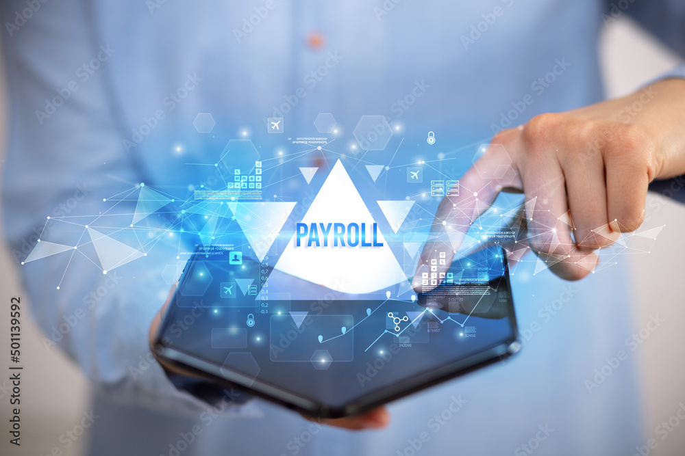 Businessman holding a foldable smartphone, business concept Businessman holding a foldable smartphone, business concept