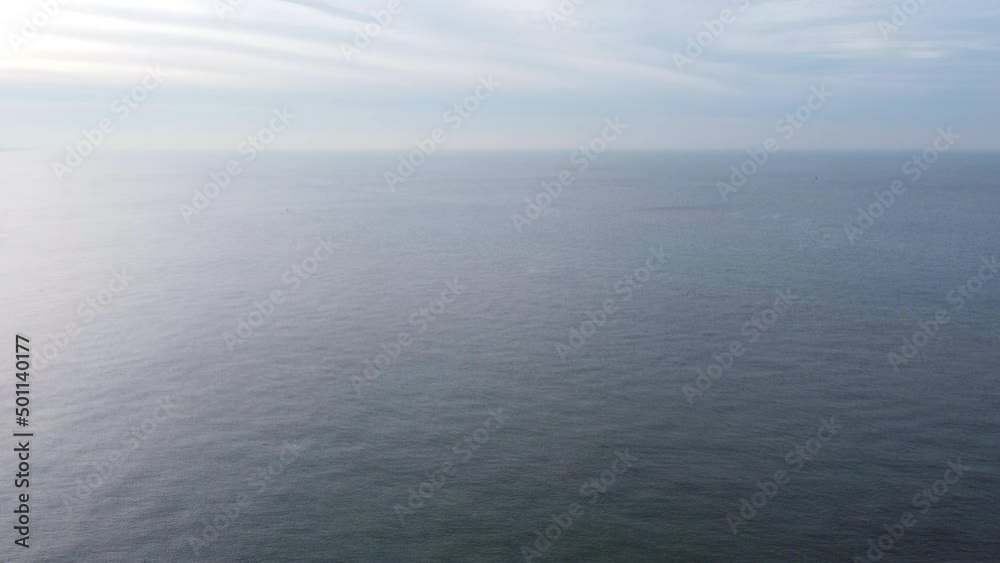Beautiful scene of calm ocean surface. Aerial flying forward Beautiful scene of calm ocean surface. Aerial flying forward