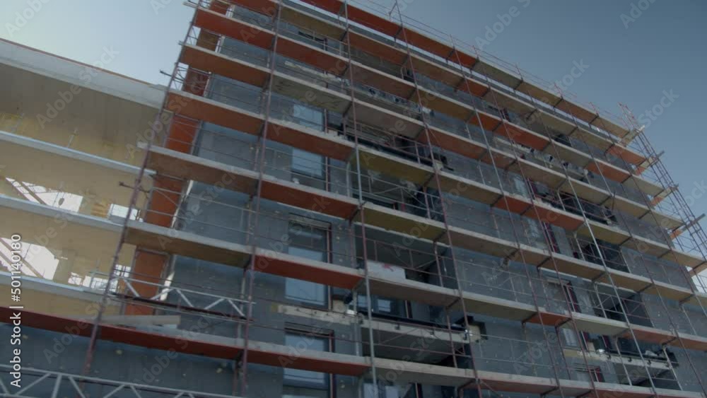 Low Angle- Lateral Shot Of An Unfinished Building Site Low Angle- Lateral Shot Of An Unfinished Building Site
