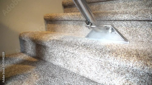 Stair cleaning with carpet. Professional maids service. photo