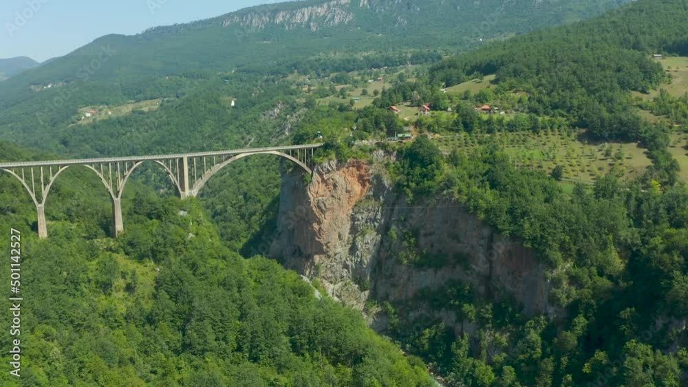 Aerial view of arched bridge of Djurdjevic in Montenegro over the Tara river Aerial view of arched bridge of Djurdjevic in Montenegro over the Tara river