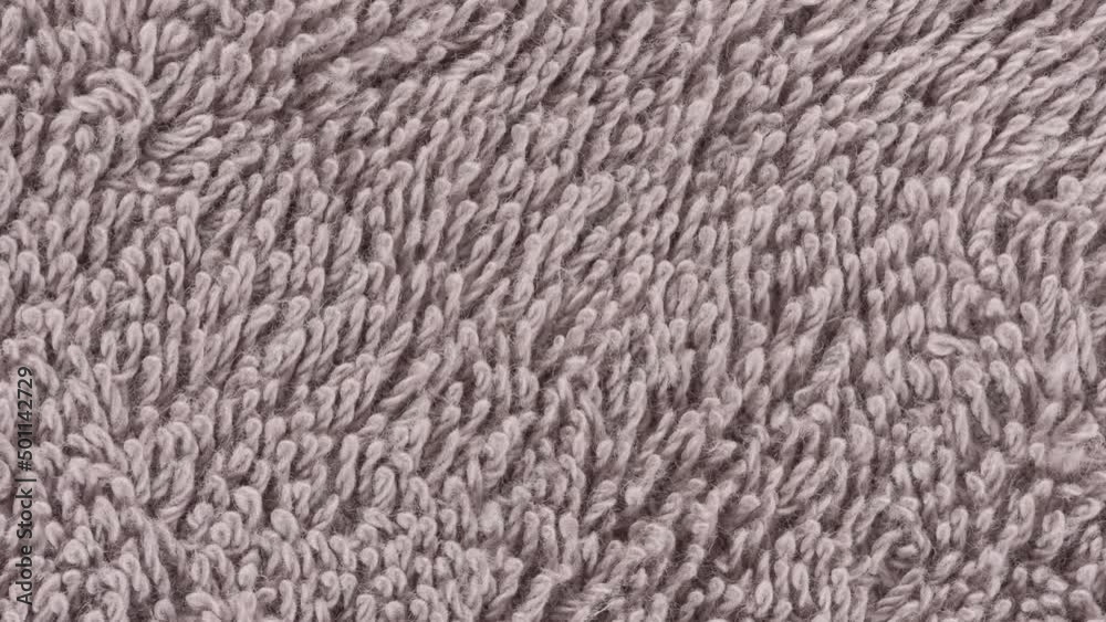 Closeup of a brown towel. Textile details backdrop Closeup of a brown towel. Textile details backdrop