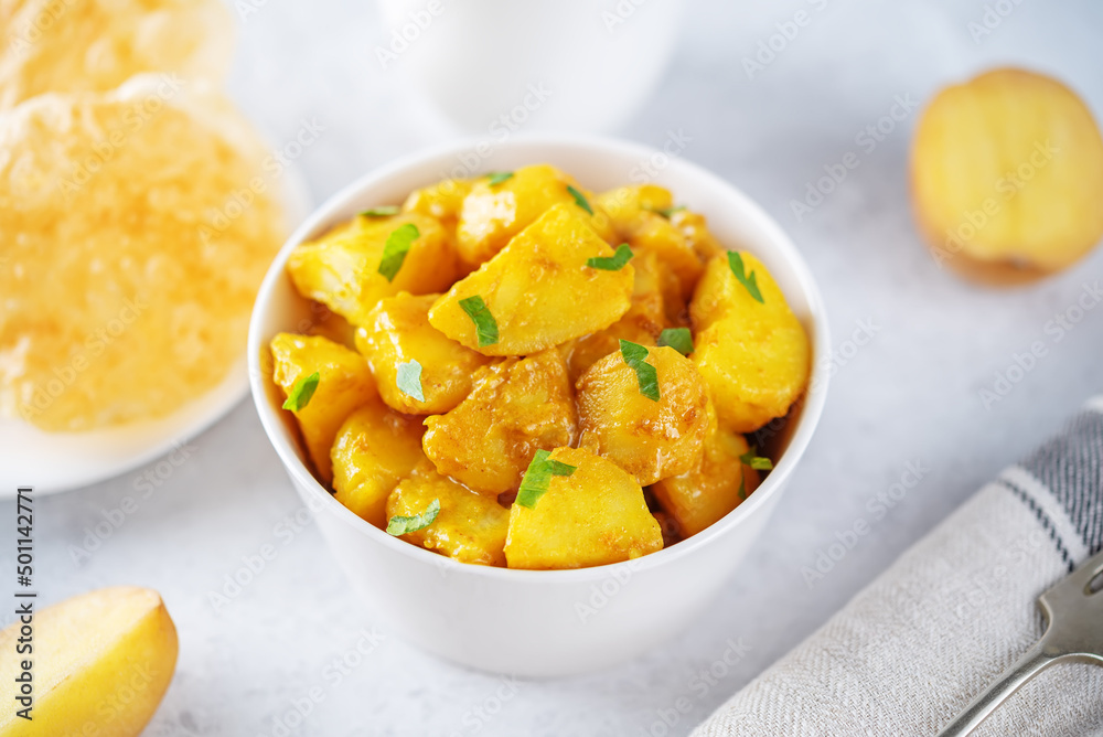 Curry potato with poori bread Curry potato with poori bread
