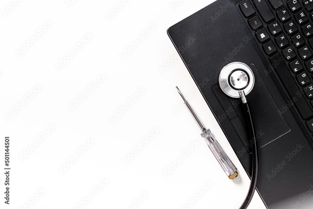 Computer with stethoscope. Tech support or repaire pc system concept Computer with stethoscope. Tech support or repaire pc system concept