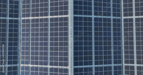 Wallpaper Mural Aerial view Rooftop of industrial building with Ecology alternative solar power station on flat roof providing the residential part with renewable energy production from sun for green ecological world Torontodigital.ca