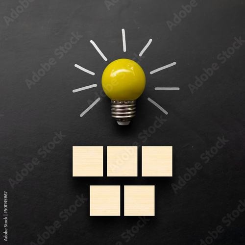 business and education concept. creative idea and innovation. wooden cubes on blackboard with copy space. 3D illustration photo