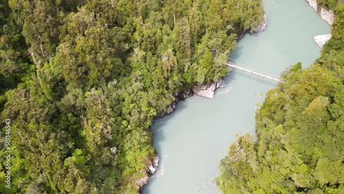 Aerial view of Hokitika Gorge. Turquoise green river water, lush pristine native forest, suspension bridge. Tourist attraction in New Zealand photo