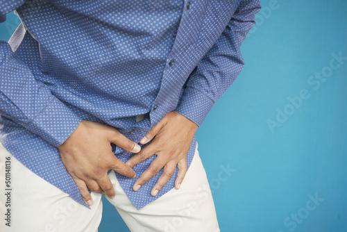 the concept of prostate and bladder problem, crotch pain of a young person 