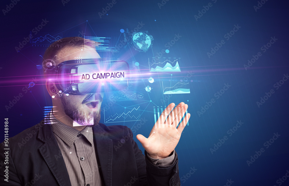 Businessman looking through Virtual Reality glasses Businessman looking through Virtual Reality glasses