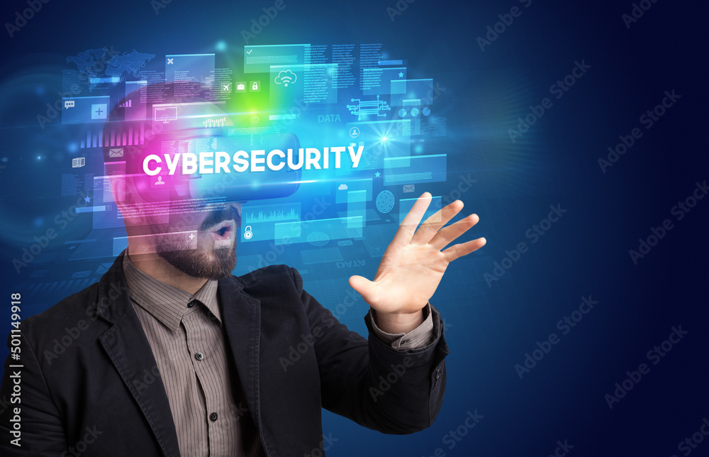 Businessman looking through Virtual Reality glasses Businessman looking through Virtual Reality glasses