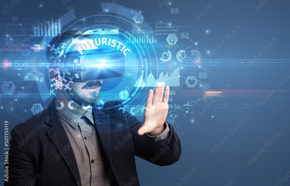 Businessman looking through VR glasses Businessman looking through VR glasses