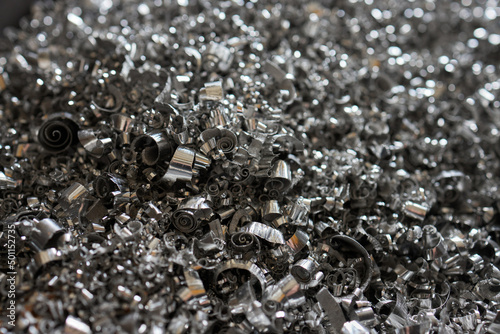 A lot of metal shavings close-up, after working on a milling machine or CNC machine.