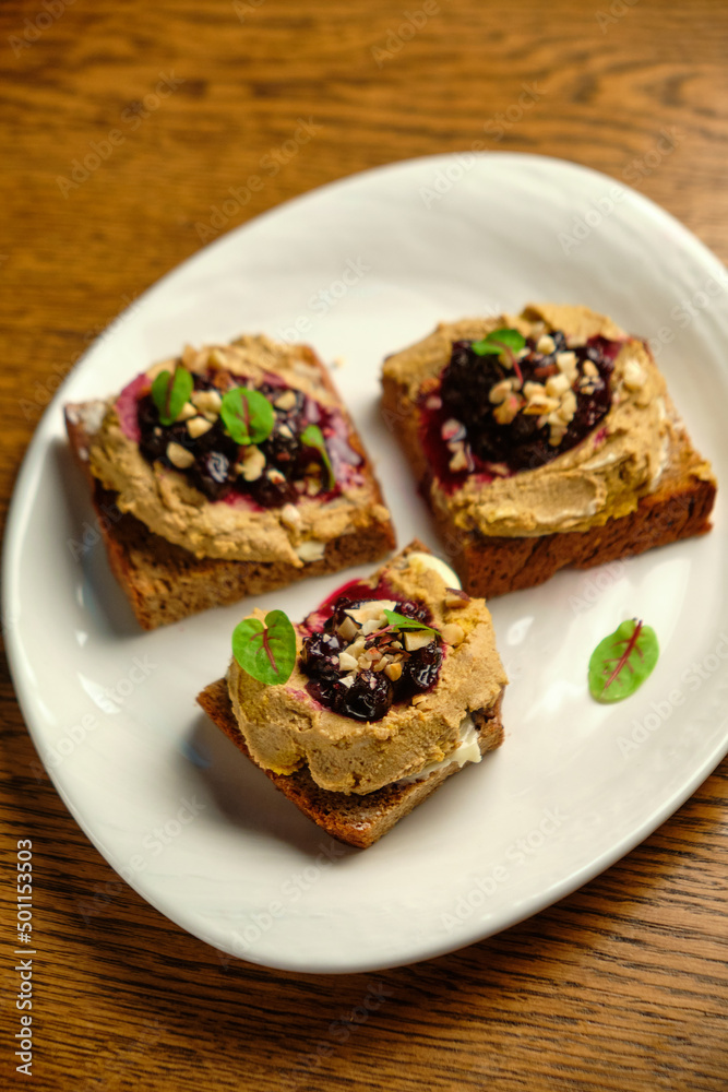 homemade meat pate on toasted crusty bread. homemade meat pate on toasted crusty bread.