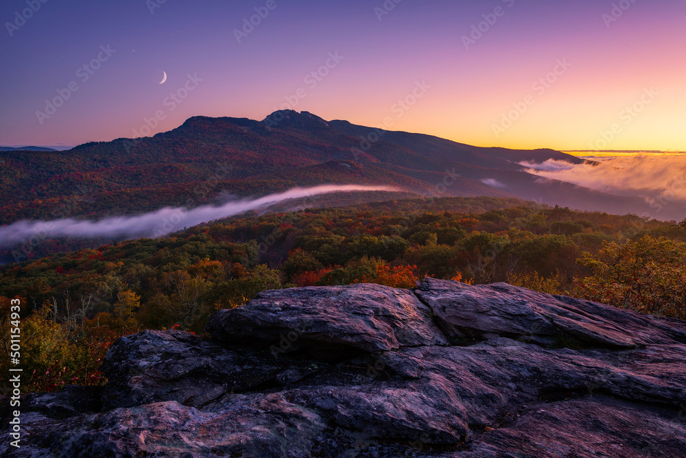 Scenic sunrise over an autumn landscape near Grandfather Mountain along the Blue Ridge Parkway in North Carolina