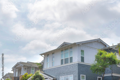 Low angle view of a house with shingles and board and batten sidings at La Jolla, California