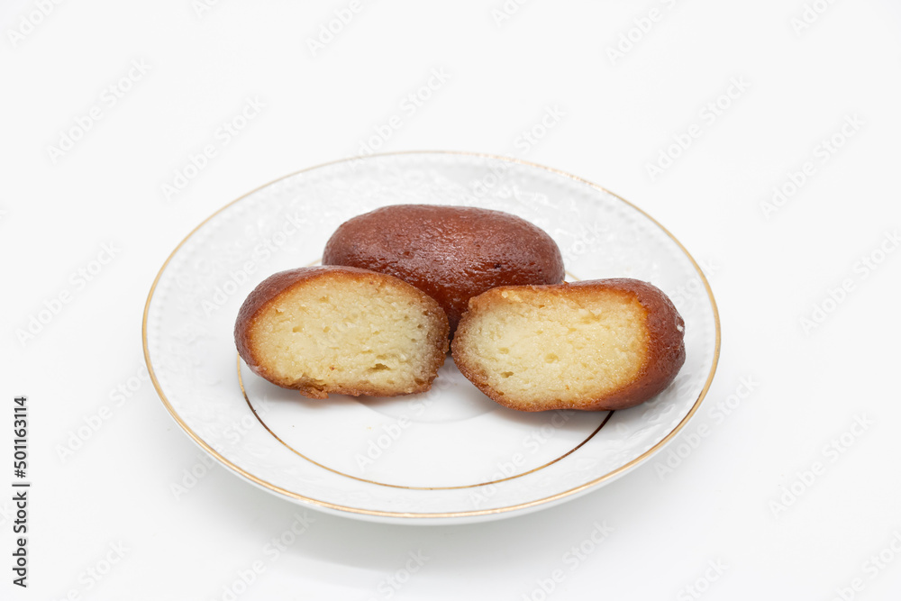 black Rasgulla Also Know as golabjamon over on white background black Rasgulla Also Know as golabjamon over on white background