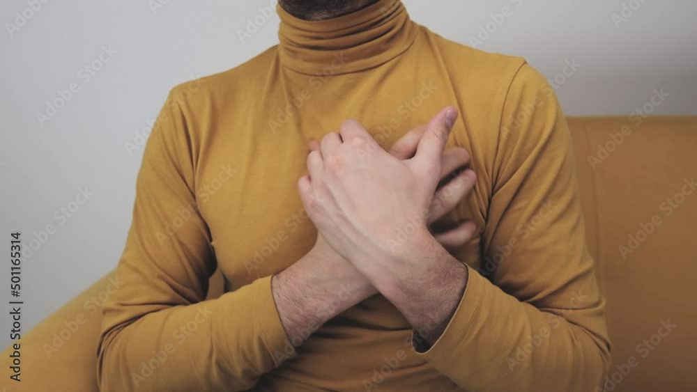 Adult man with chest pain and heart attack, panic, anxiety issues.