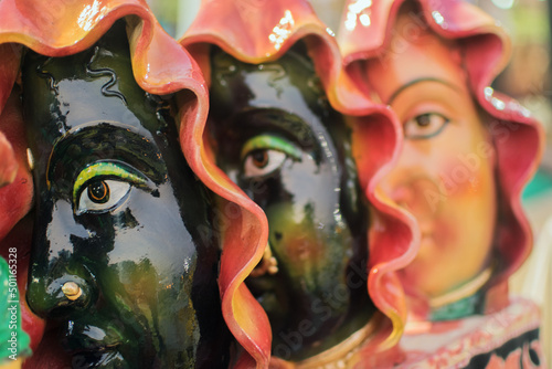 KOLKATA, WEST BENGAL , INDIA - NOVEMBER 23RD 2014 : Eyes of terracotta dolls, artworks of handicraft, on display during Handicraft Fair in Kolkata - the biggest handicrafts fair in Asia. photo