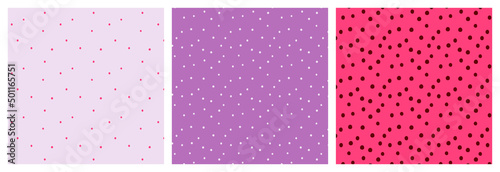Girly seamless pattern with chaotic tiny dots on colorful pink and purple backgrounds.