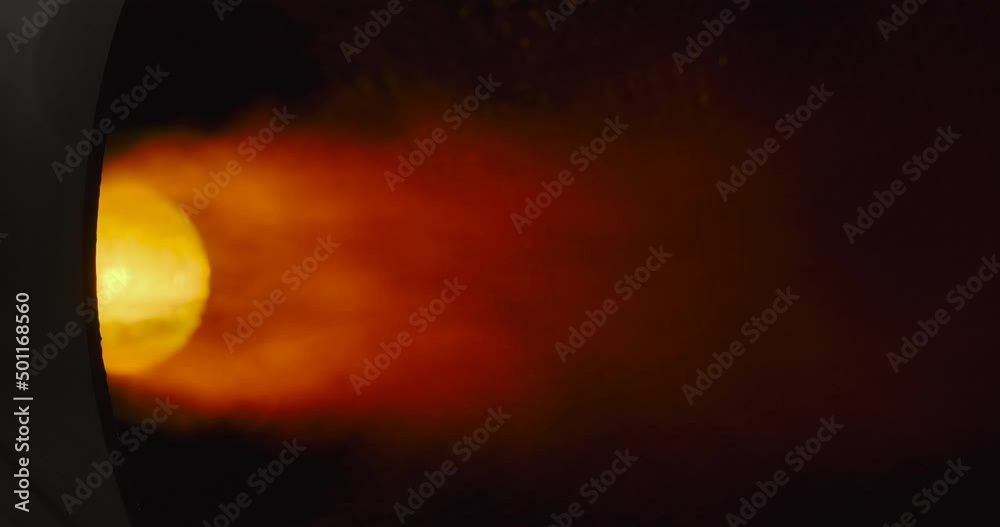 bright fire bursts from the rocket engine nozzle