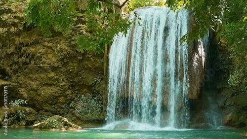 Beautiful waterfall and emerald pool in tropical rain forest in Thailand..
