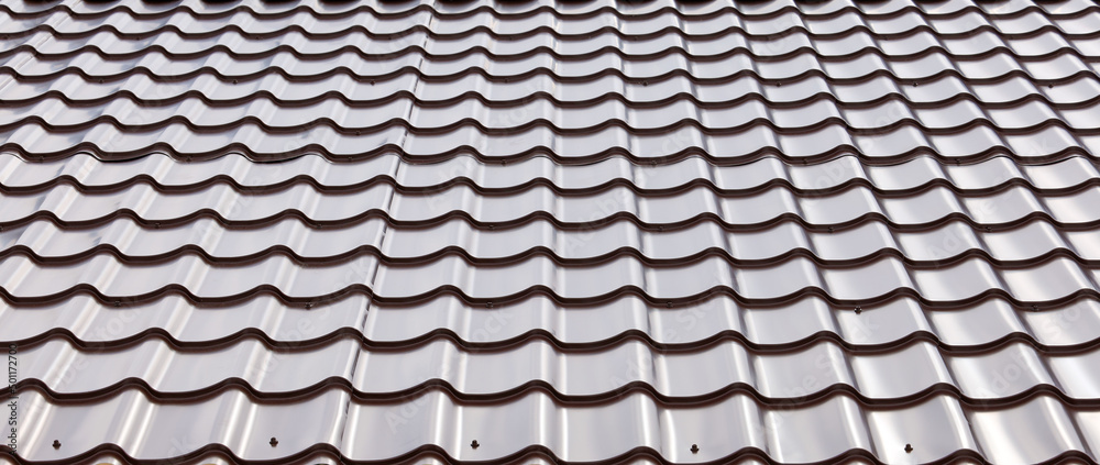 Tiled metal brown roof, texture slope of surface