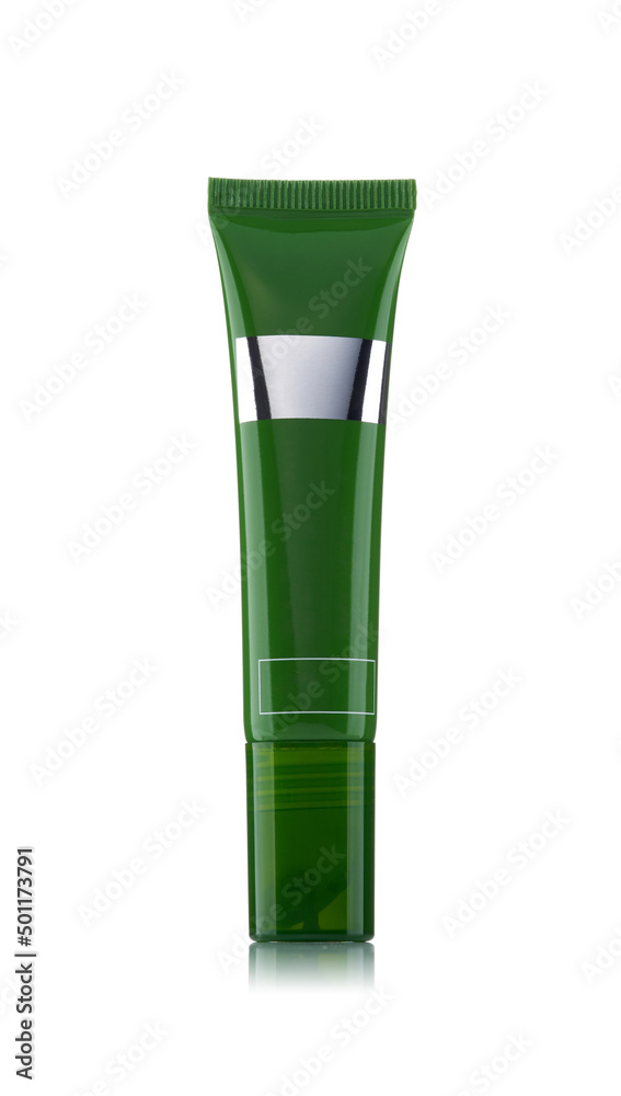 Green plastic tube for cosmetics isolated on a white background. Green plastic tube for cosmetics isolated on a white background.