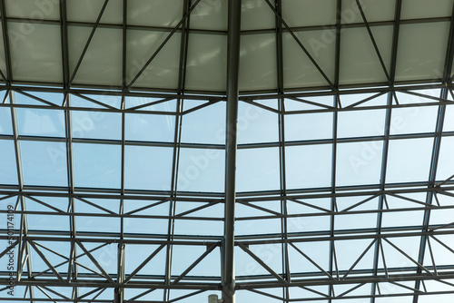 Glass roof with steel structure. Modern ceiling architecture