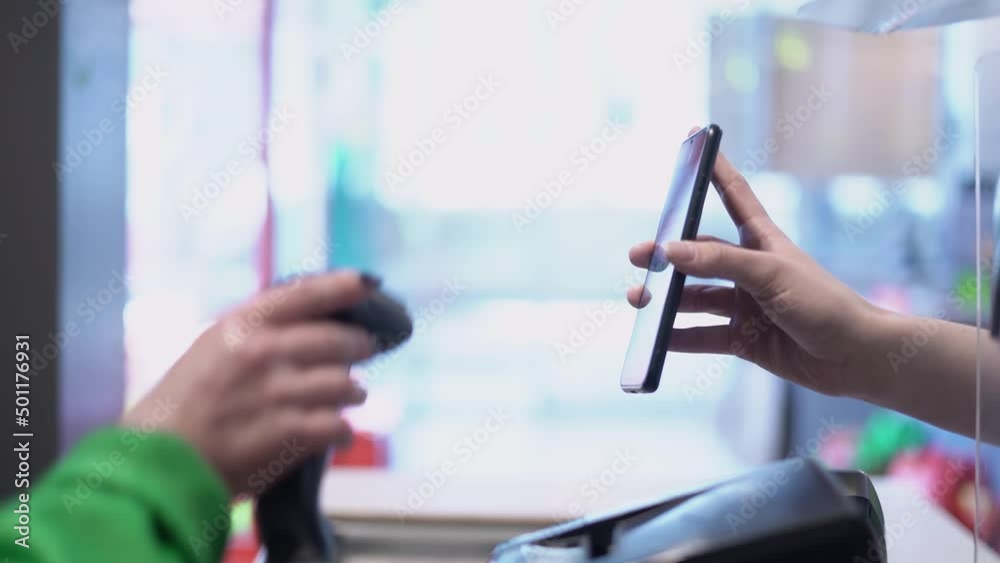 The cashier scans the smartphone screen. Purchase or bonus system The cashier scans the smartphone screen. Purchase or bonus system