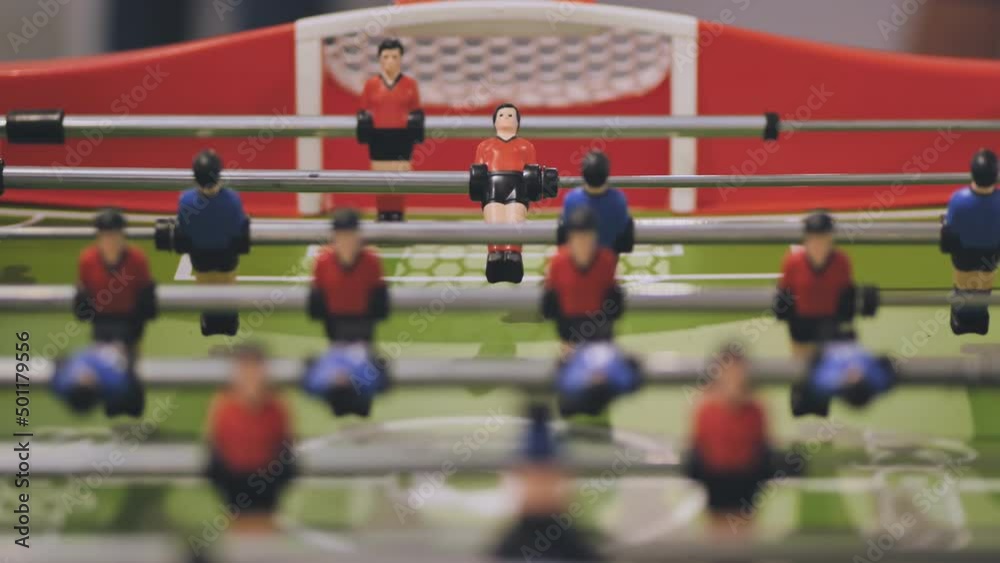 Players play table football in the clubhouse. Players play table football in the clubhouse.