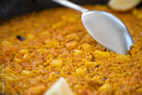 Fototapeta Naklejka Na Ścianę i Meble -  Typical restaurant paella rice paella a banda