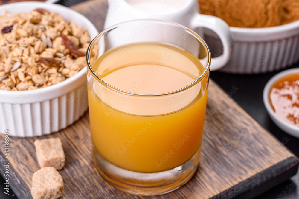Delicious nutritious healthy breakfast with granola, eggs, oat cookies, milk and jam Delicious nutritious healthy breakfast with granola, eggs, oat cookies, milk and jam