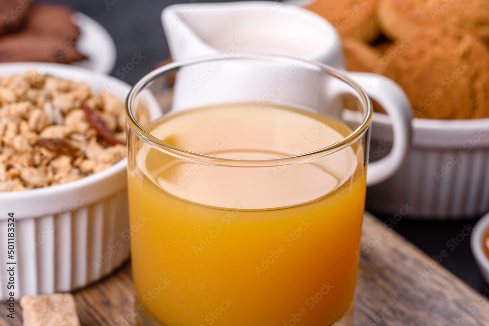 Delicious nutritious healthy breakfast with granola, eggs, oat cookies, milk and jam Delicious nutritious healthy breakfast with granola, eggs, oat cookies, milk and jam