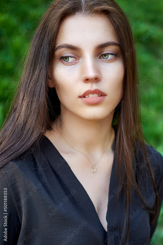 Beautiful woman face close up portrait. Nature background Beautiful woman face close up portrait. Nature background