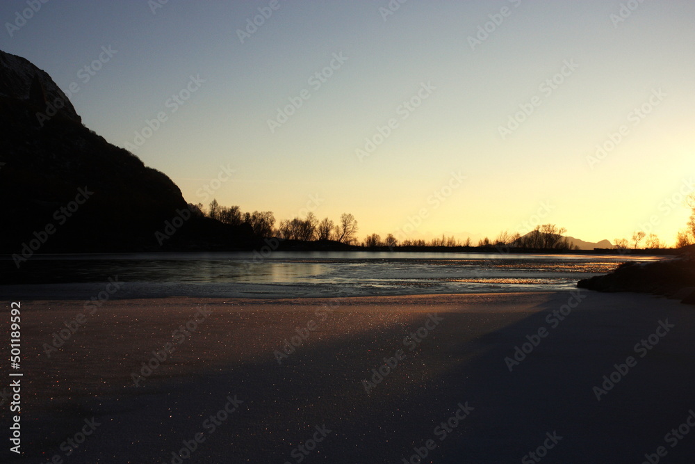 Sunrise On A Frozen Lake