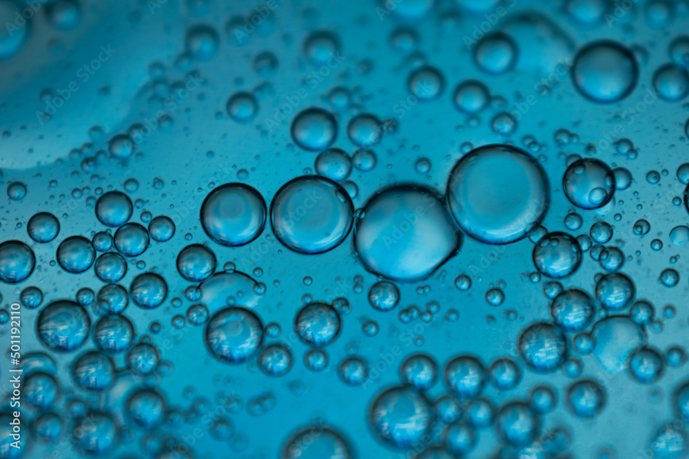 Bubbles in water on a blue background