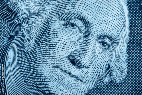 Close up of first USA president George Washington on one Dollar bancnote as symbol of economy, finances and business of America. photo