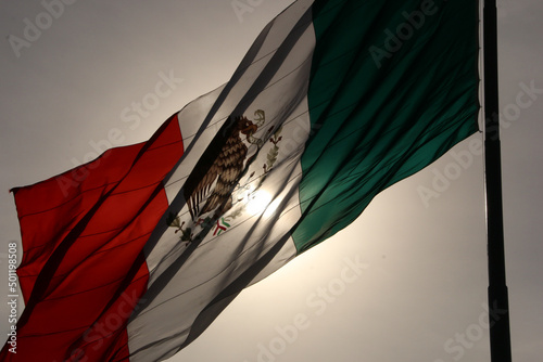 Mexico City, Mexico – April 16, 2020: Mexican flag on a close up showing it´s color and movement © AndreaQuinteroOlivas