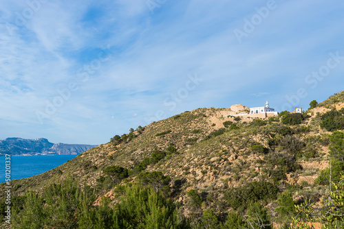 Albir lighthouse in Sierra Helada, Alfaz del Pi, Alicante, Spain. photo