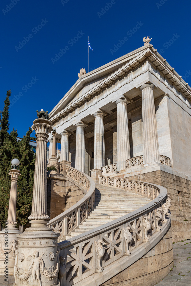Vallianeio Megaron entrance and stairs, sunny day, blue sky. The historic building housed the National Library until 2017, Athens, Greece