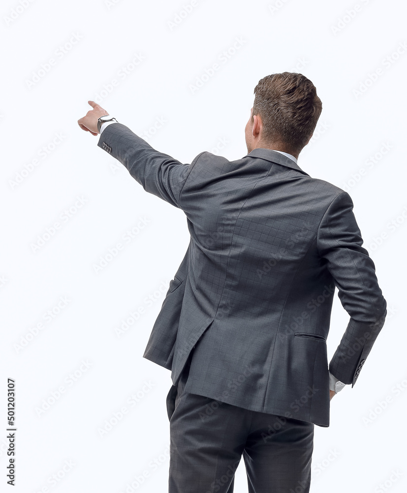 young businessman pointing at a large white screen. isolated on white young businessman pointing at a large white screen. isolated on white