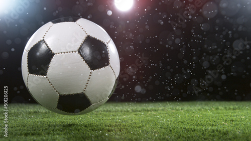 Close-up of Falling Soccer Ball on Football Field © Lukas Gojda