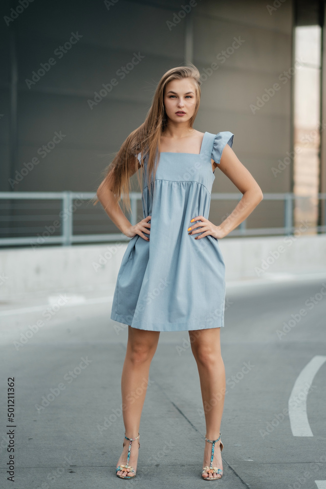 Lady walking down the street in summer dress. Summer clothes collection. Lady walking down the street in summer dress. Summer clothes collection.