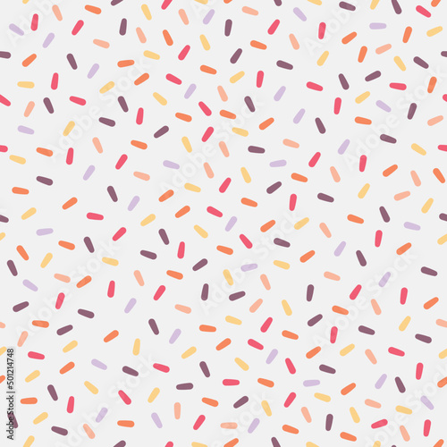 Seamless repeat pattern of colorful sugar sprinkles vector illustration